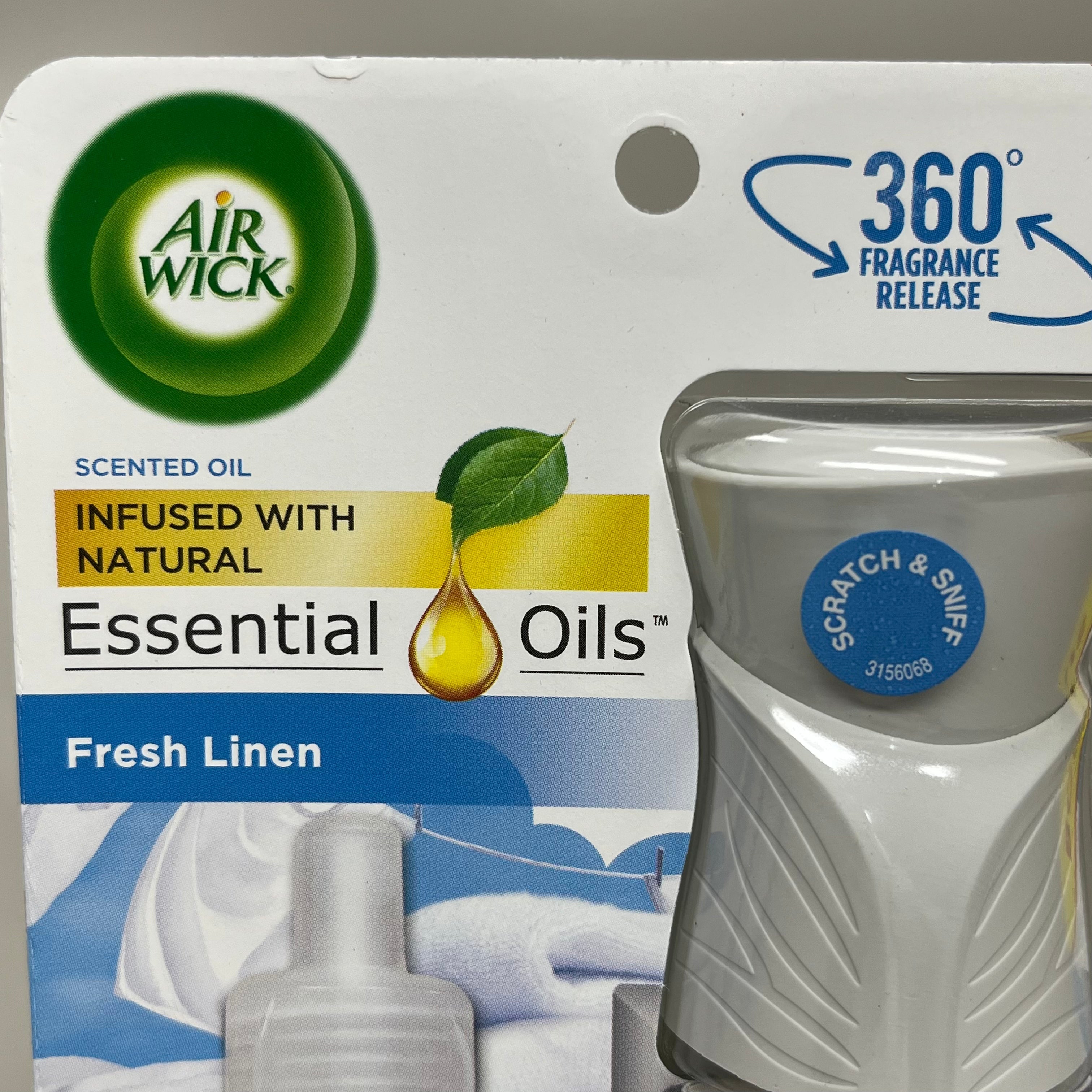 AIR WICK Plug in Air Freshener w/ Fresh Linen scent & essential oils .67 fl oz. / 20 ml (New) (May 10th-16th)Sale!